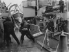 June 9, 1953 - Personnel of USS Buck transferring munitions to HMCS Haida during a patrol off the coast of Korea.  Courtesy Library and Archives Canada.